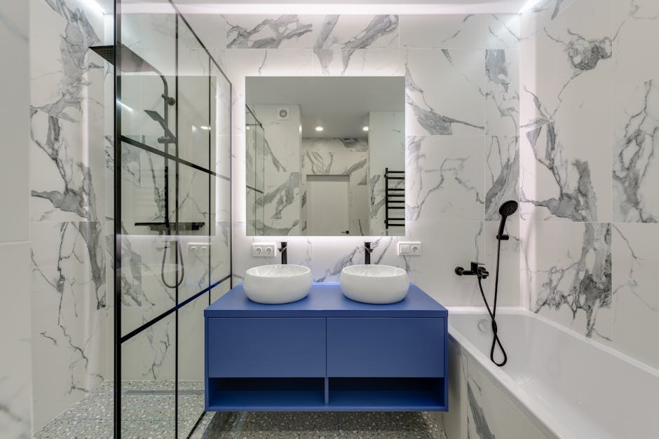 Contractor carefully measuring for a bathroom remodel